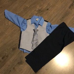 Matching shirt pants vest and tie